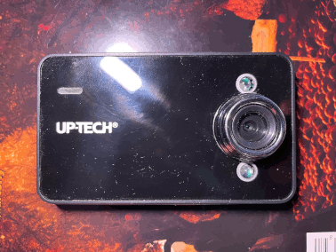 Front-facing photo of a cheap, ugly dollar store camera