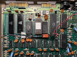 Kernal switcher installed on Commodore 64 mainboard, top view